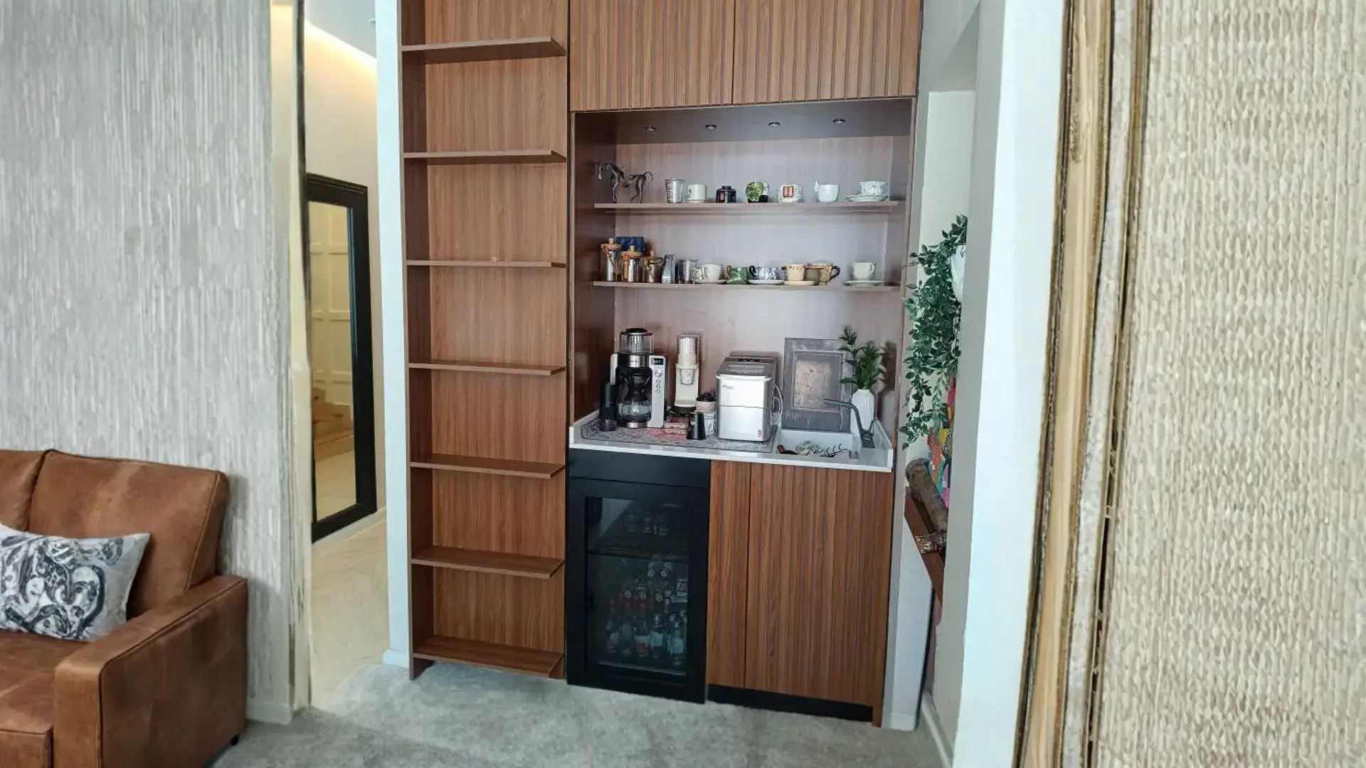 Custom luxury wardrobe with ambient LED lighting designed in Muzeirea Ajman