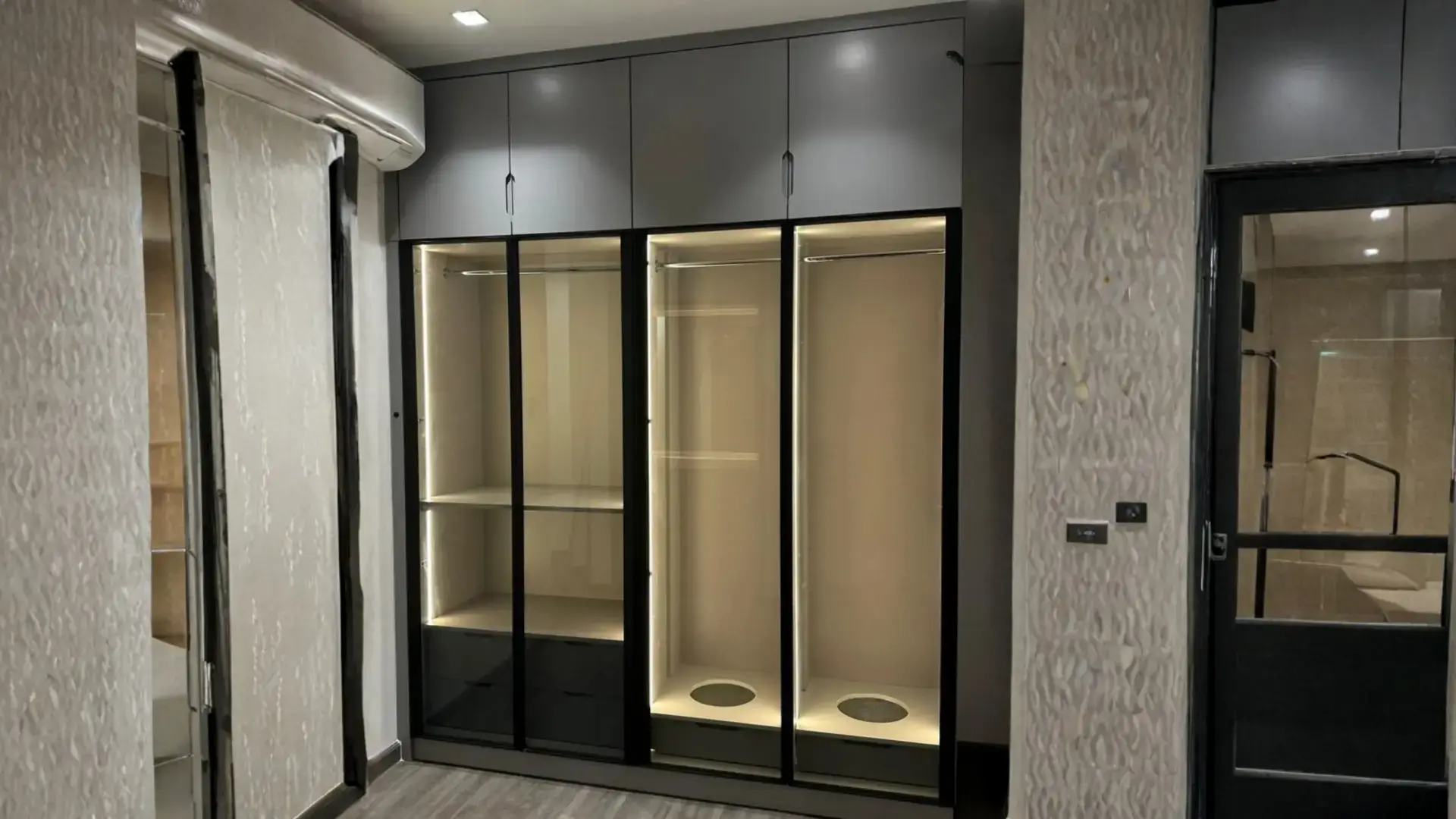 Modern custom bedroom cupboard installation by Muzeirea Carpentry UAE